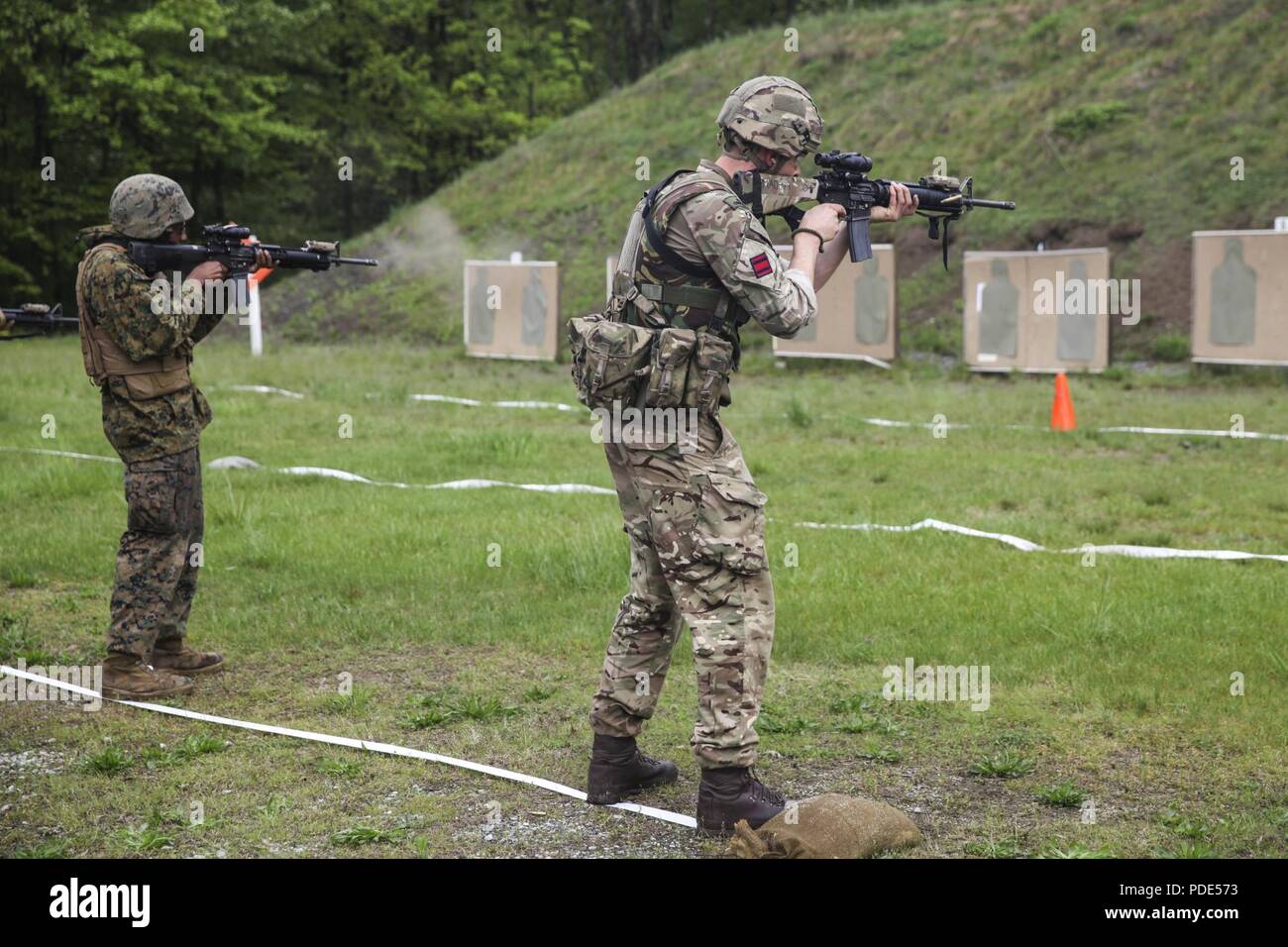 U.S. Marine Lance Cpl. Michael D. Foy (left), motor vehicle operator