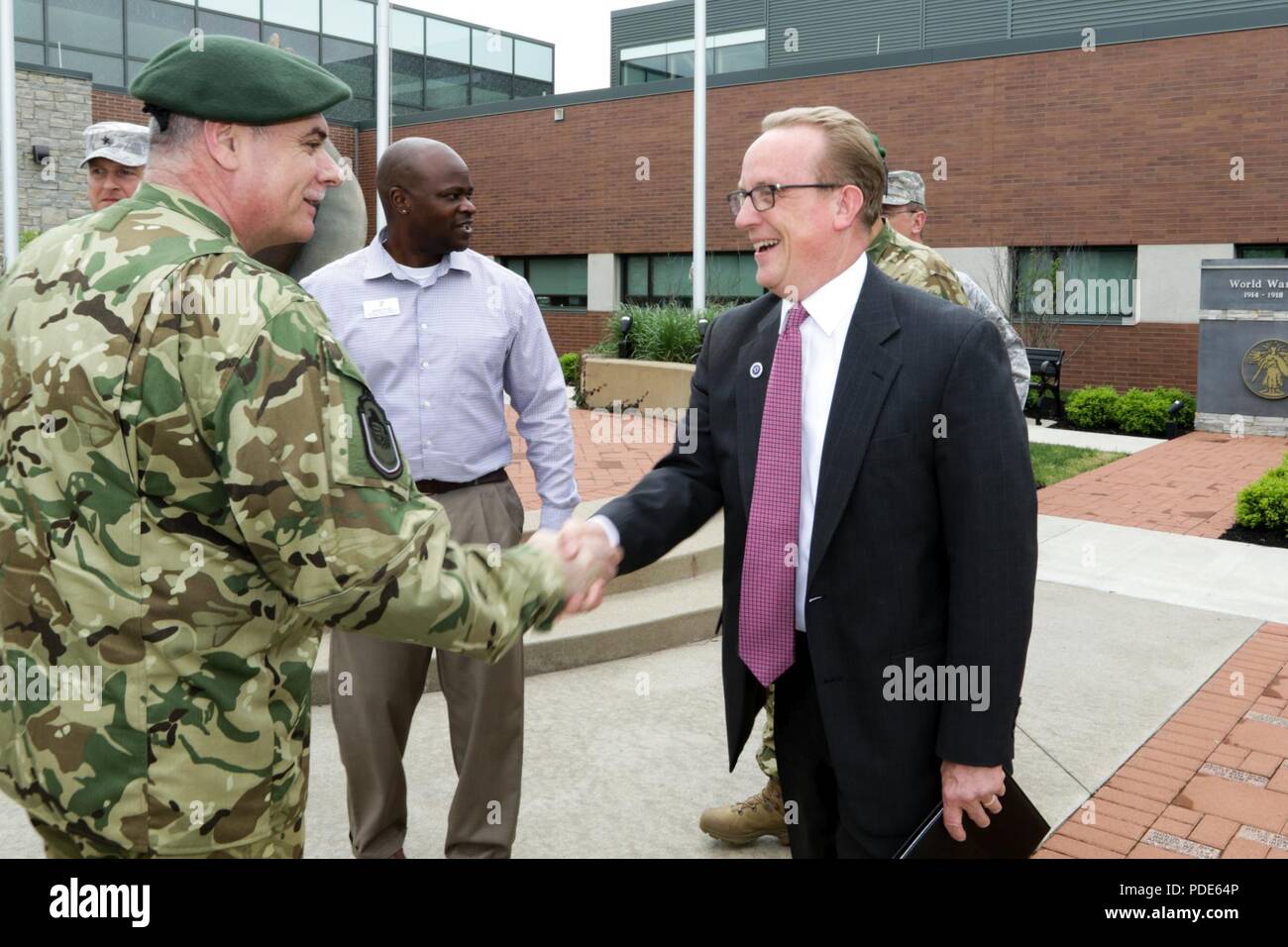 Tom Homan (right), Delaware, Ohio city manager, thanks Maj. Gen. Istvan