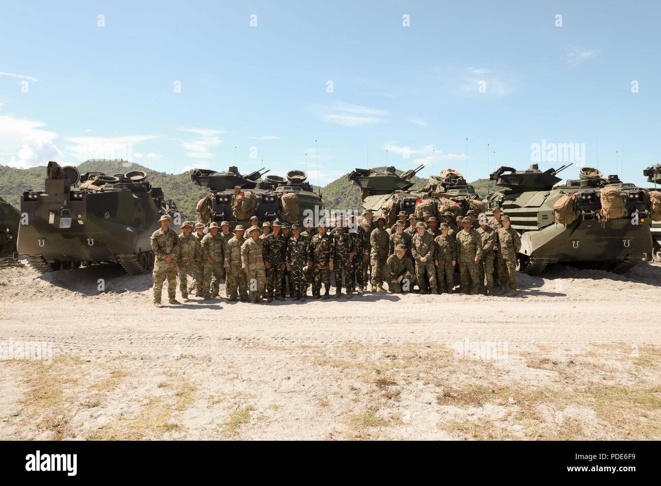 Philippine Army soldiers from the 72nd Division Reconnaissance Company, 7th Infantry Division, along with U.S. service members from 1st Battalion, 21st Infantry Regiment, 2nd Infantry Brigade Combat Team, 25th Infantry Division and 3rd Medical Battalion, 3rd Marine Logistics Group, gather for a Stock Photo