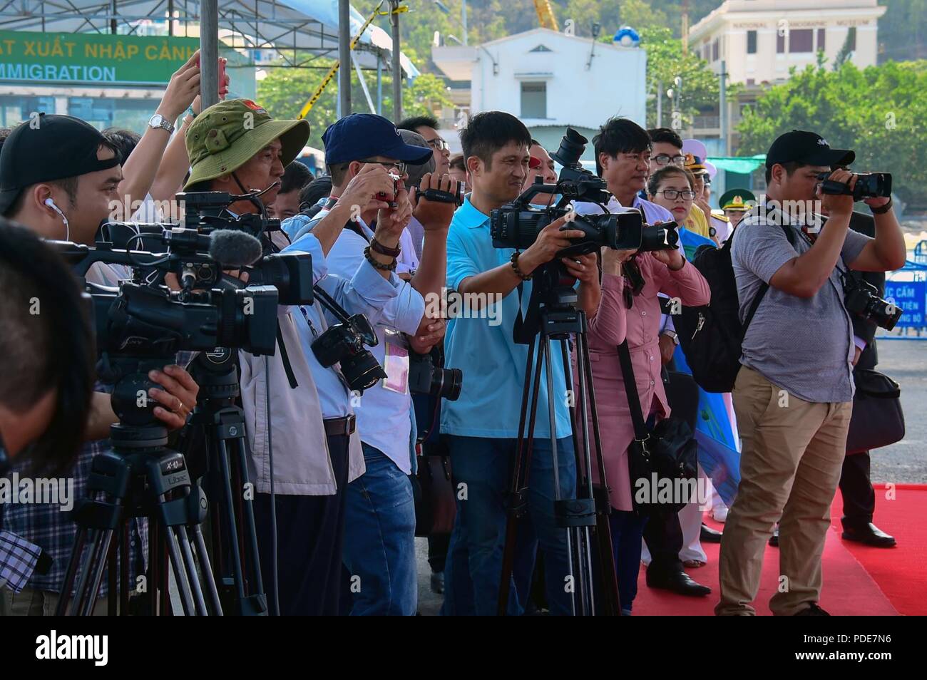NHA TRANG, Vietnam (May 17, 2018) Members of the media gather for a press conference after the opening ceremony for Pacific Partnership 2018 (PP18). PP18’s mission is to work collectively with host and partner nations to enhance regional interoperability and disaster response capabilities, increase stability and security in the region, and foster new and enduring friendships across the Indo-Pacific Region. Pacific Partnership, now in its 13th iteration, is the largest annual multinational humanitarian assistance and disaster relief preparedness mission conducted in the Indo-Pacific. Stock Photo