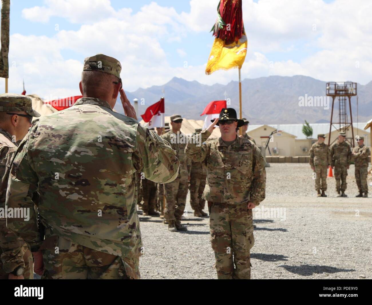 FORWARD OPERATING BASE LIGHTNING, Afghanistan (May 18, 2018) - U.S. Army  Maj. Daniel Britz salutes U.S. Army Brig. Gen. Richard Johnson, commander,  Task Force Southeast in front of a formation of soldiers
