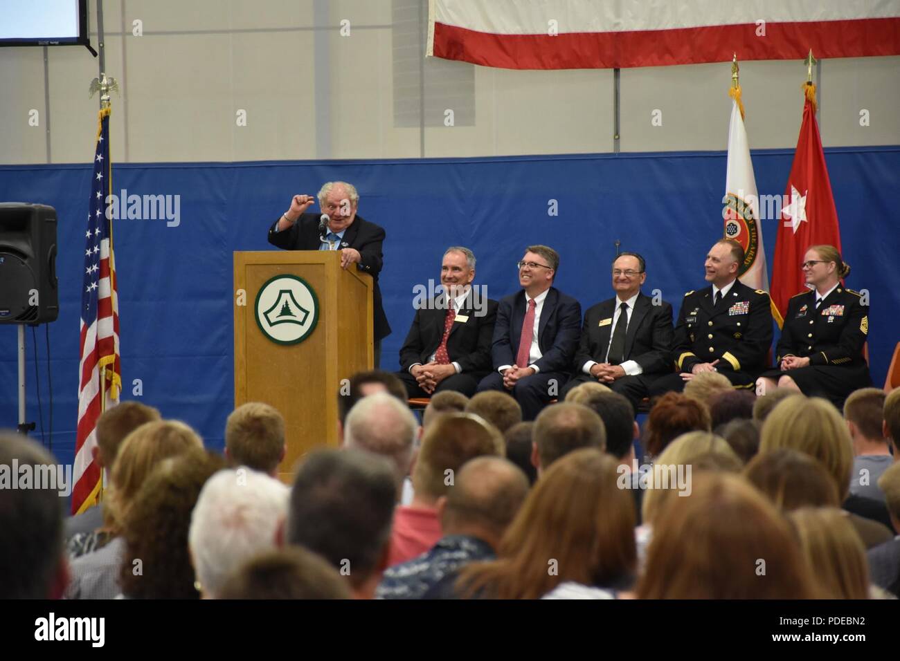 Medal of Honor recipient retired Sgt. Maj. Kenneth E. Stumpf describes throwing hand grenades in Vietnam during the Our Community Salutes event on Armed Forces Day, May 19, at Fort McCoy, Wisconsin. Community Salutes honor graduating high school seniors who have enlisted in the Armed Forces. Stock Photo