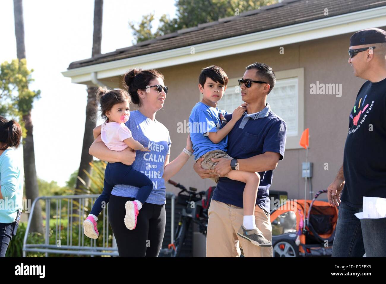U.S. Air Force Tech. Sgt. Peter Amaro, 60th Logistic Readiness Squadron, holds his son May 18