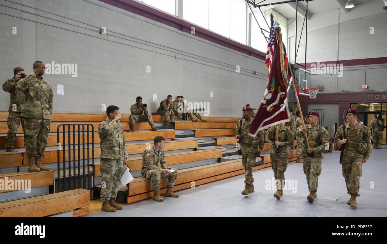 U.S. Paratroopers of the 307th Brigade Support Battalion, 82nd Airborne Division, demonstrate the pass and review during the Color Guard Competition on Fort Bragg, N.C., May 18, 2018. The competiton is held to see who will earn the chance to perform as color guard during the events of the All american Week celebration. Stock Photo