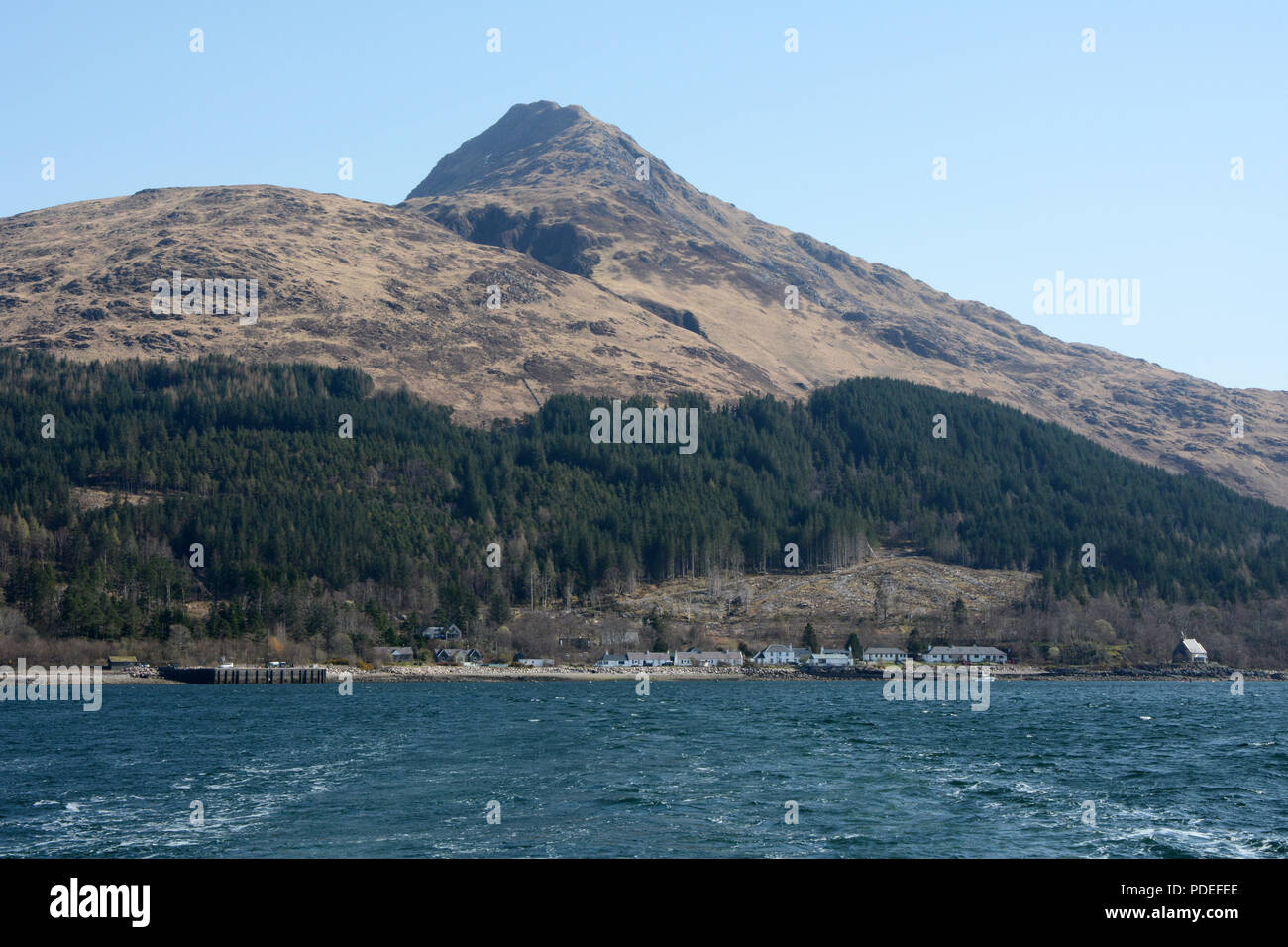 Mountains and forest above the village of Inverie, on Loch Nevis, in the Knoydart Peninsula, northwest Scottish Highlands, Scotland, Great Britain. Stock Photo