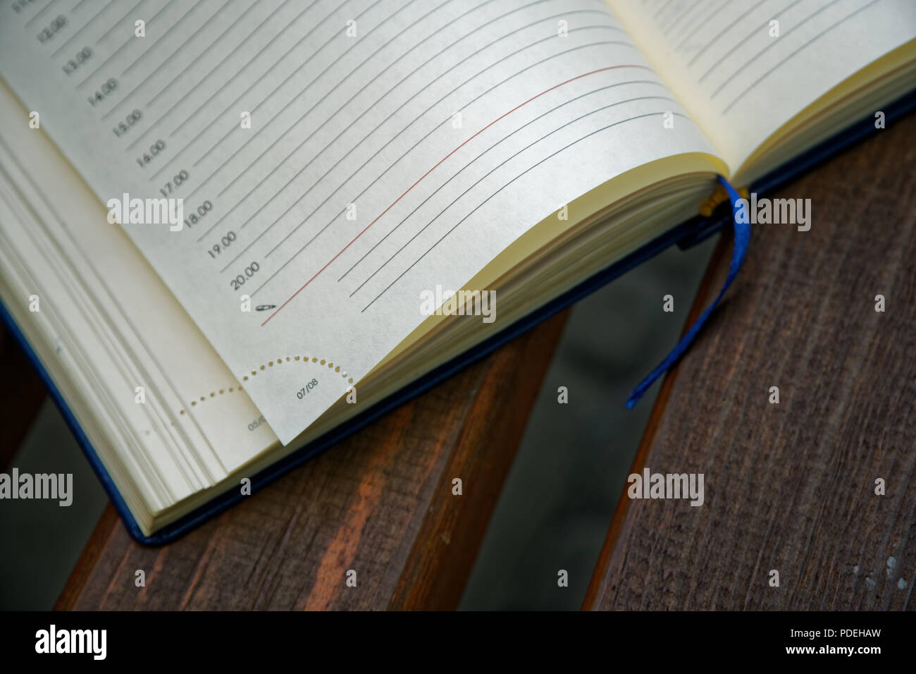 Open Notebook lies bench in park, business concept Stock Photo - Alamy