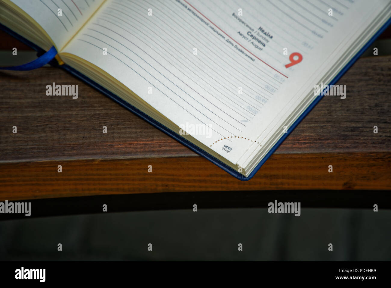 Open Notebook lies bench in park, business concept Stock Photo - Alamy