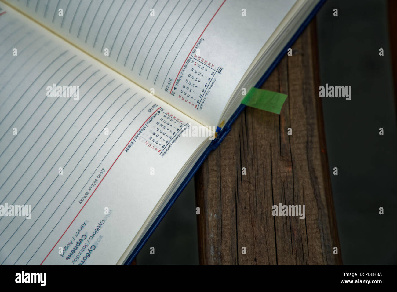 Open Notebook lies bench in park, business concept Stock Photo - Alamy