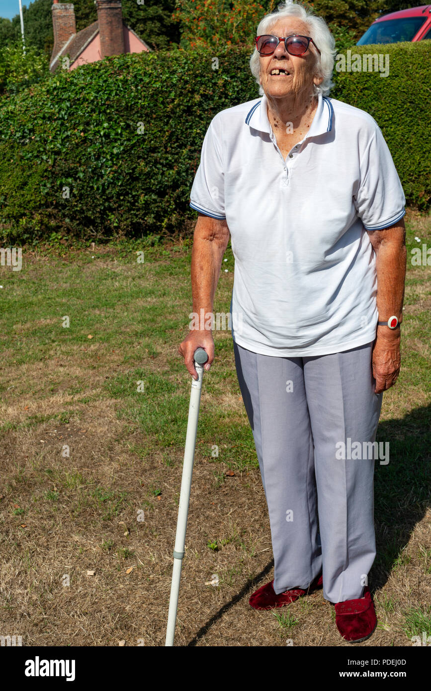 Partially sighted woman suffering from age-related  Macular degeneration Stock Photo