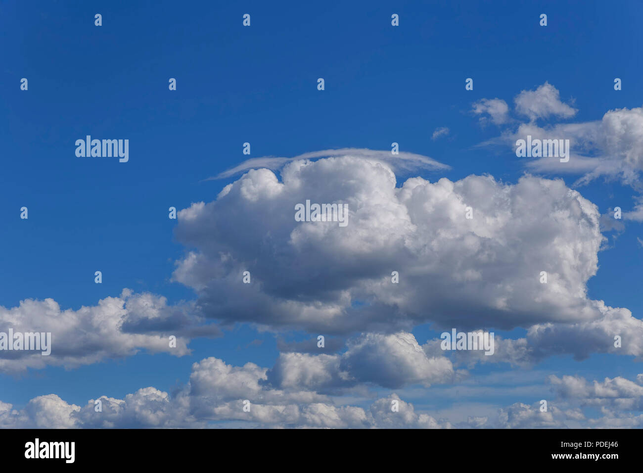 blue sky with white cumulus clouds as a natural background Stock Photo ...