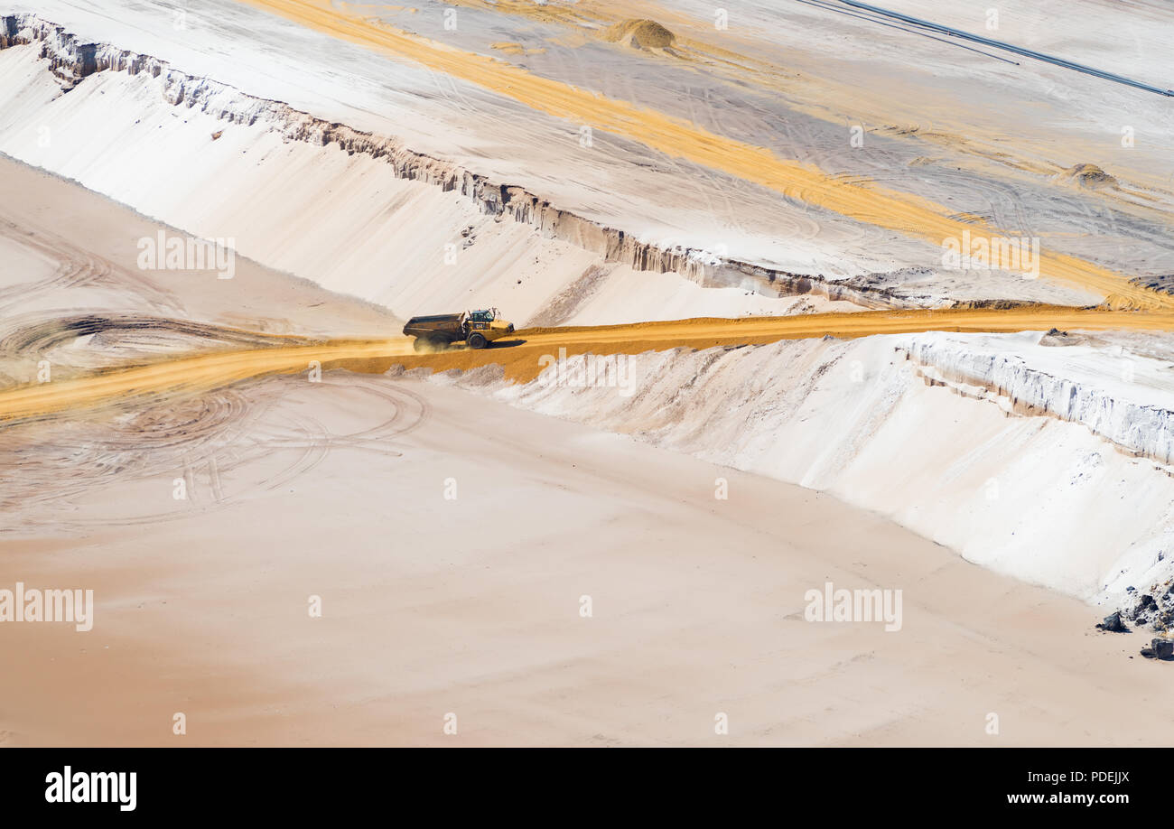 HOCHNEUKIRCH, GERMANY - JULY 7, 2018: Sand dump truck transporting sand in the Garzweiler brown coal mine Stock Photo