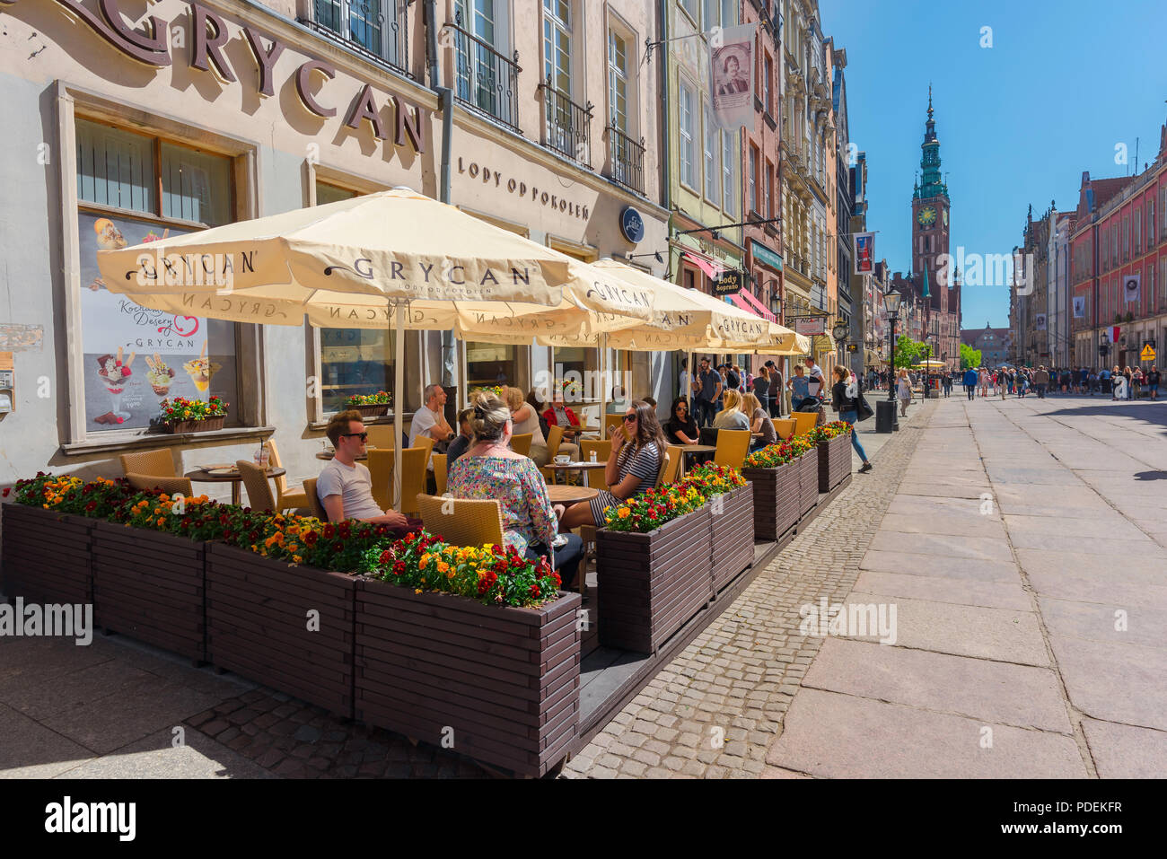 Gdansk cafe, view of people relaxing outside a cafe in Dlugi Targ (Long Market), the main thoroughfare in the Old Town quarter of Gdansk, Poland. Stock Photo