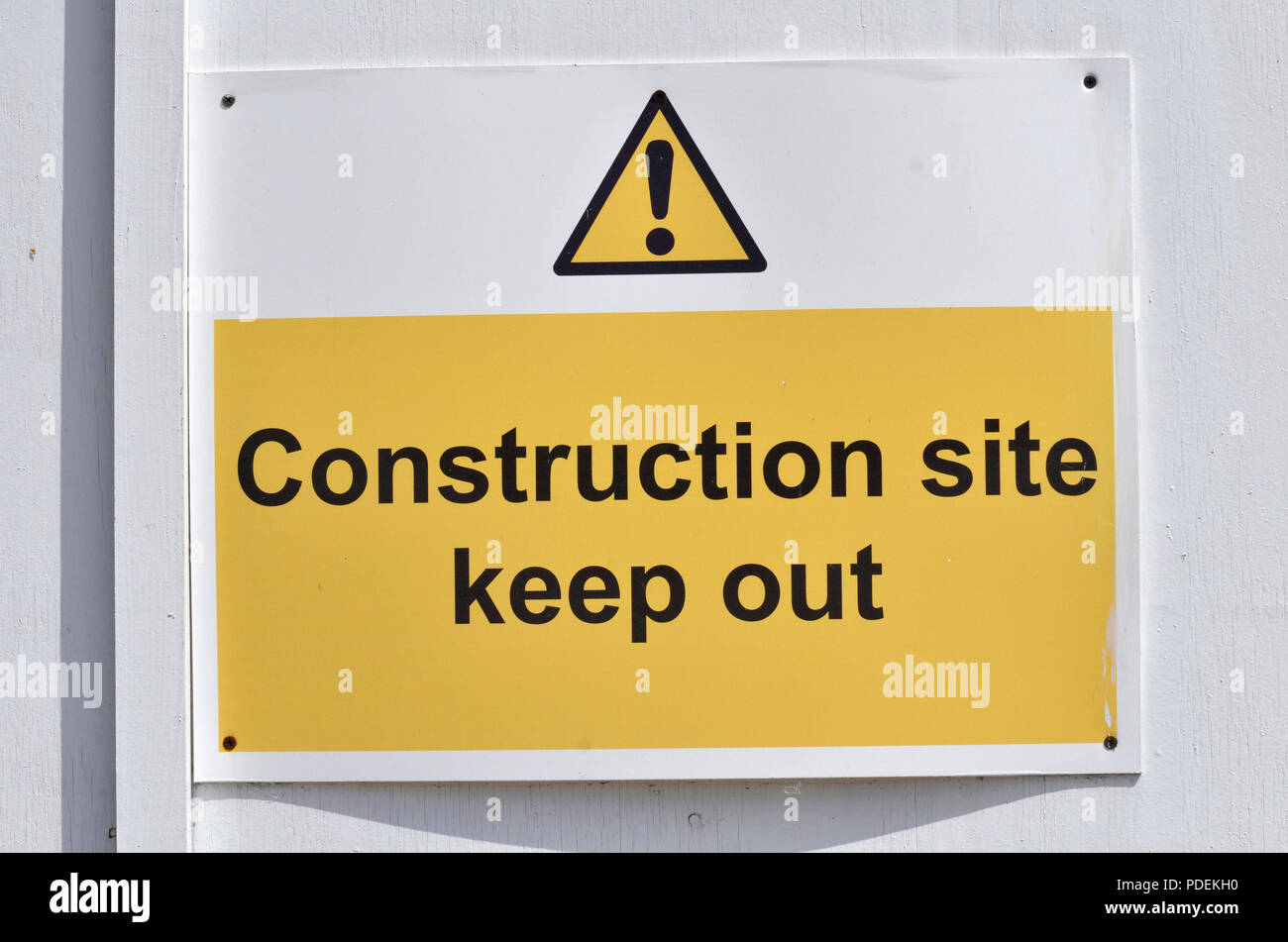 A warning sign on a construction site Stock Photo