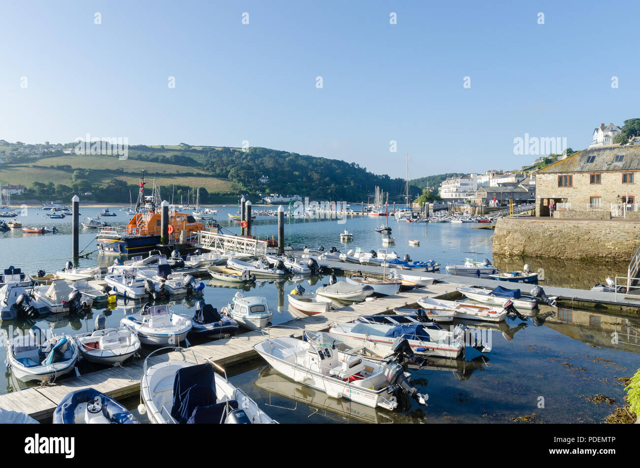 Tenders and dinghies moored on the harbour pontoon in the pretty sailing town of Salcombe in the South Hams,Devon,England Stock Photo