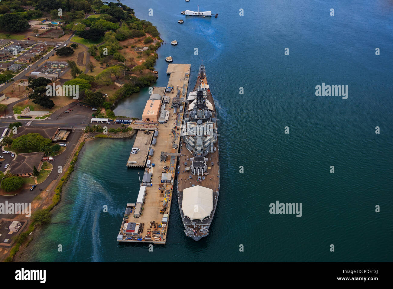 Aerial view of USS Missouri (BB-63) battleship and USS Arizona Memorial, World War II Valor In The Pacific National Monument in Pearl Harbor Honolulu  Stock Photo