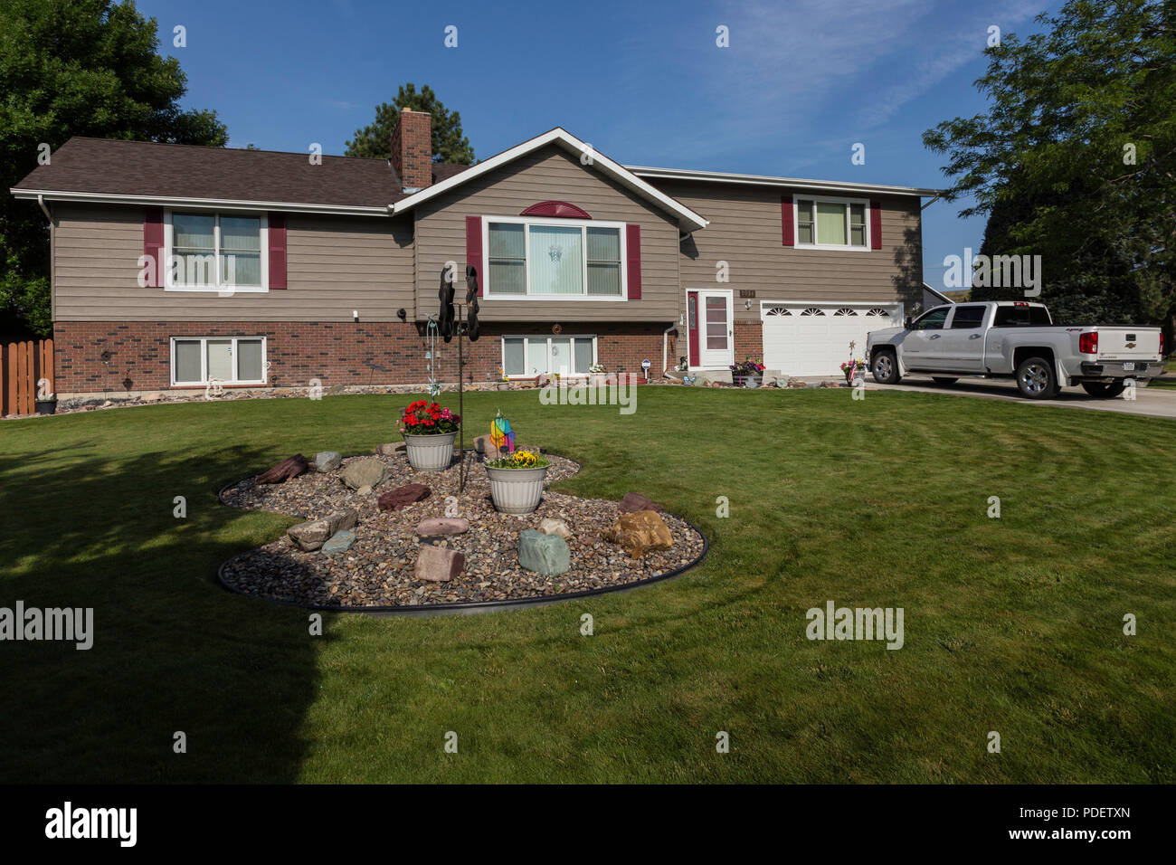 Residential House Exterior in Middle Class Neighborhood, MT, USA Stock Photo