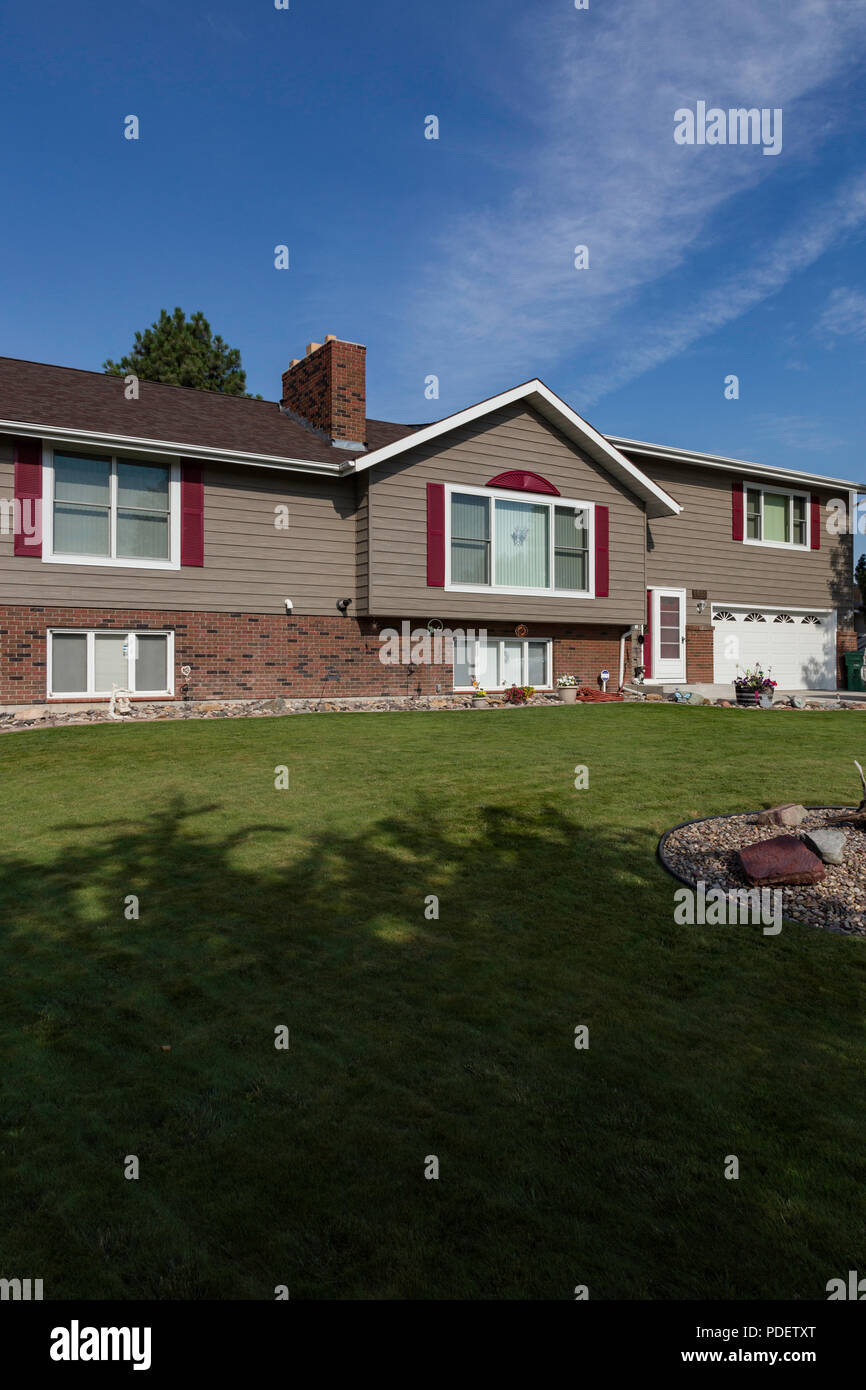 Residential House Exterior in Middle Class Neighborhood, MT, USA Stock