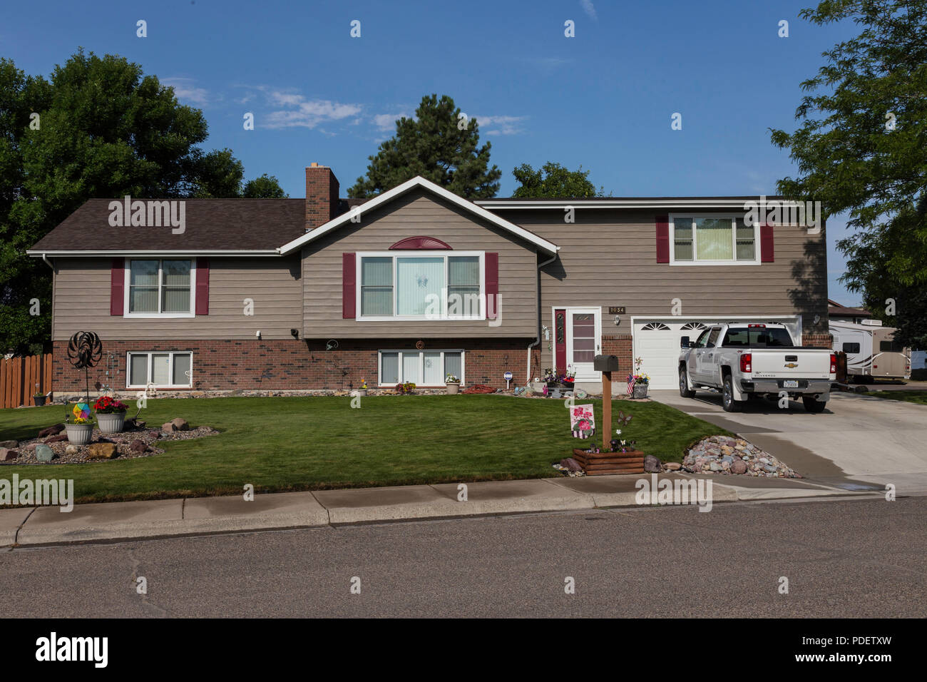 Residential House Exterior in Middle Class Neighborhood, MT, USA Stock