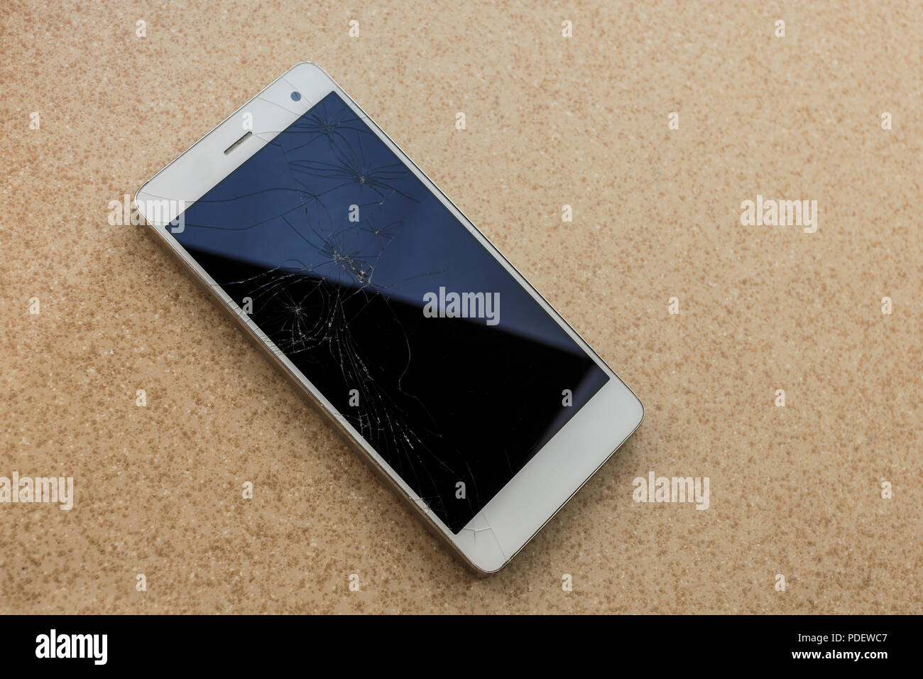 Modern touch screen smartphone with broken screen Stock Photo