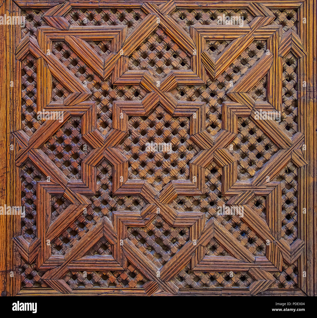 Moroccan carved wood panel on a door in Fes, Morocco Stock Photo - Alamy