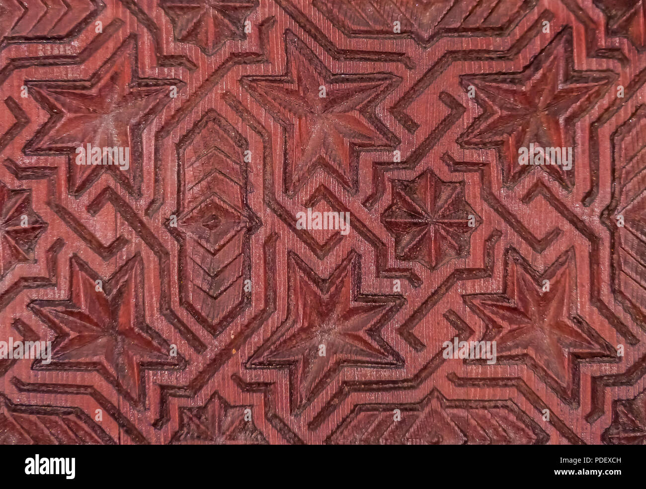 Wood carving of geometrical pattern on a door in Marakech, Morocco Stock Photo