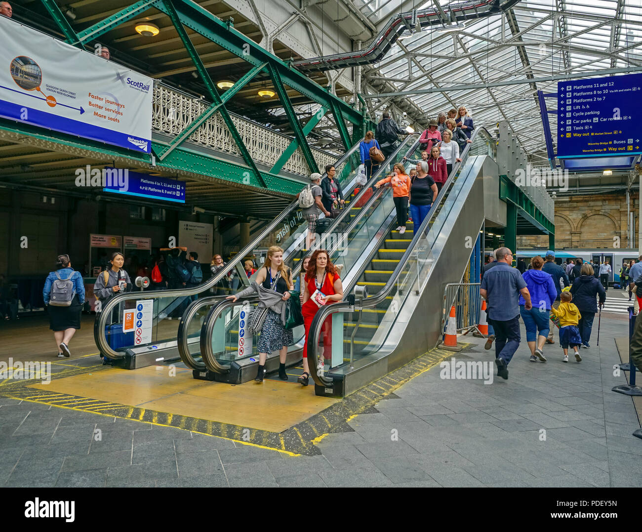 New escalators installed in Waverley railway station in city of Edinburgh Scotland UK providing access to platforms 8-10 from ground level Stock Photo