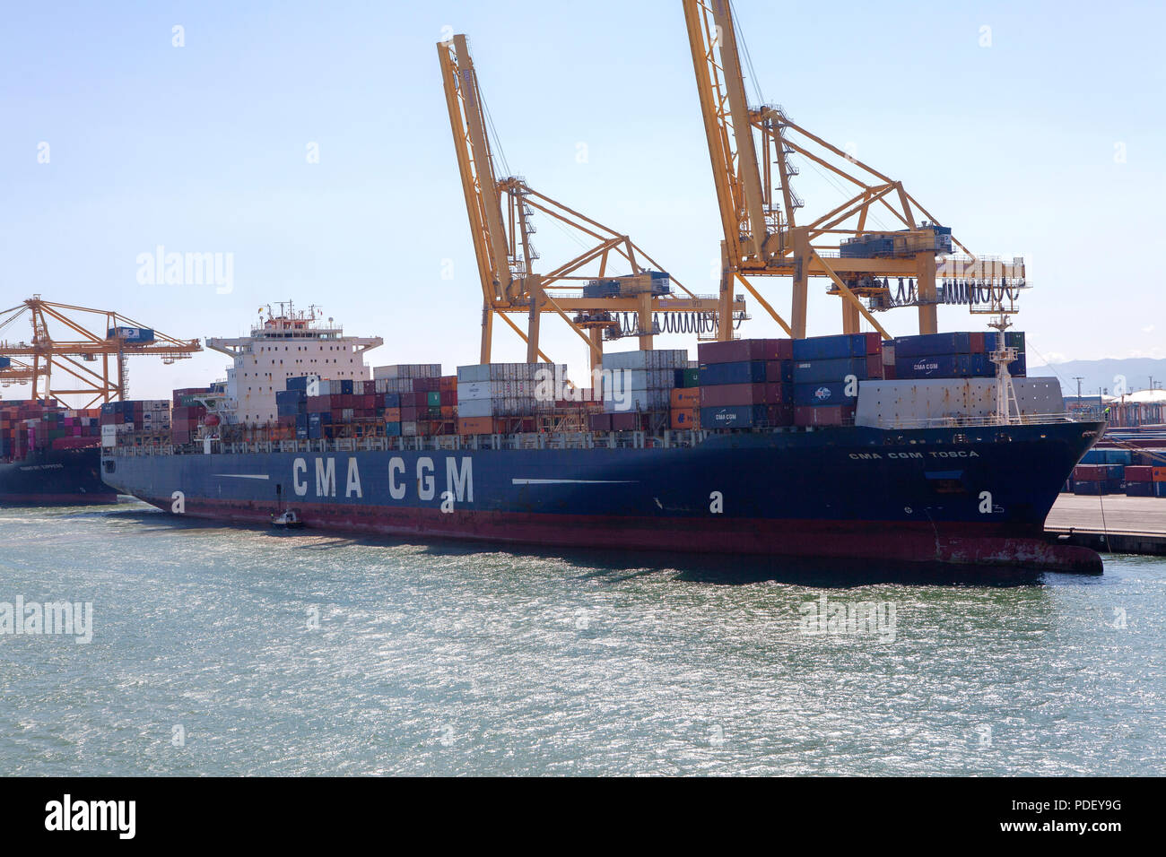Port of Barcelona working with containerised cargo in container vessels Stock Photo