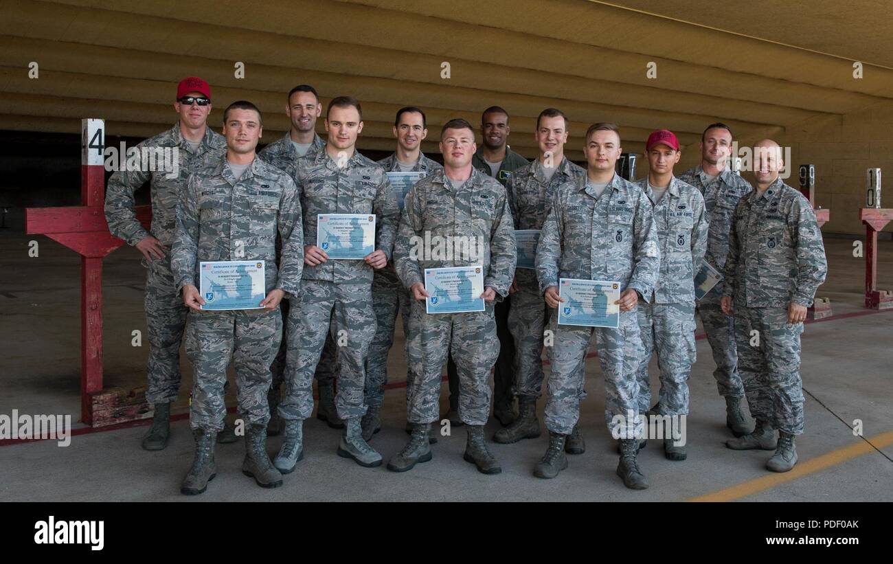 Winners of a rifle Excellence in Competition shooting event pose for a Stock Photo Alamy