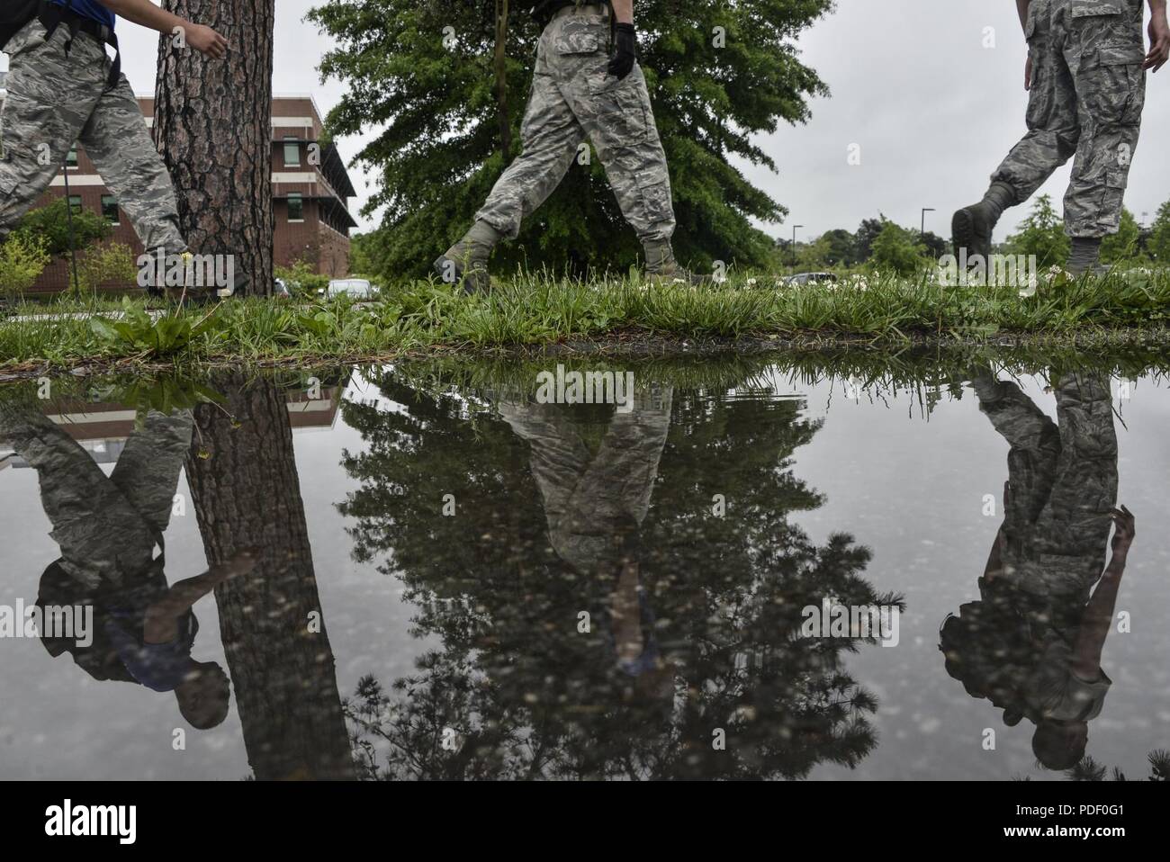 Airmen from the 70th Intelligence, Surveillance and Reconnaissance Wing  participated in the 2018 Fort Meade Super Squad Challenge May 10, 2018 at  here at Fort George G. Meade, Maryland. This year team would have to complete a five and a half mile ruck while completing physical tasks long the way. Several of the task were fireman's carry, ammo can carry up and down a hill, 150 burpees, tire flips, conjoined sit-ups and a log carry. Stock Photo