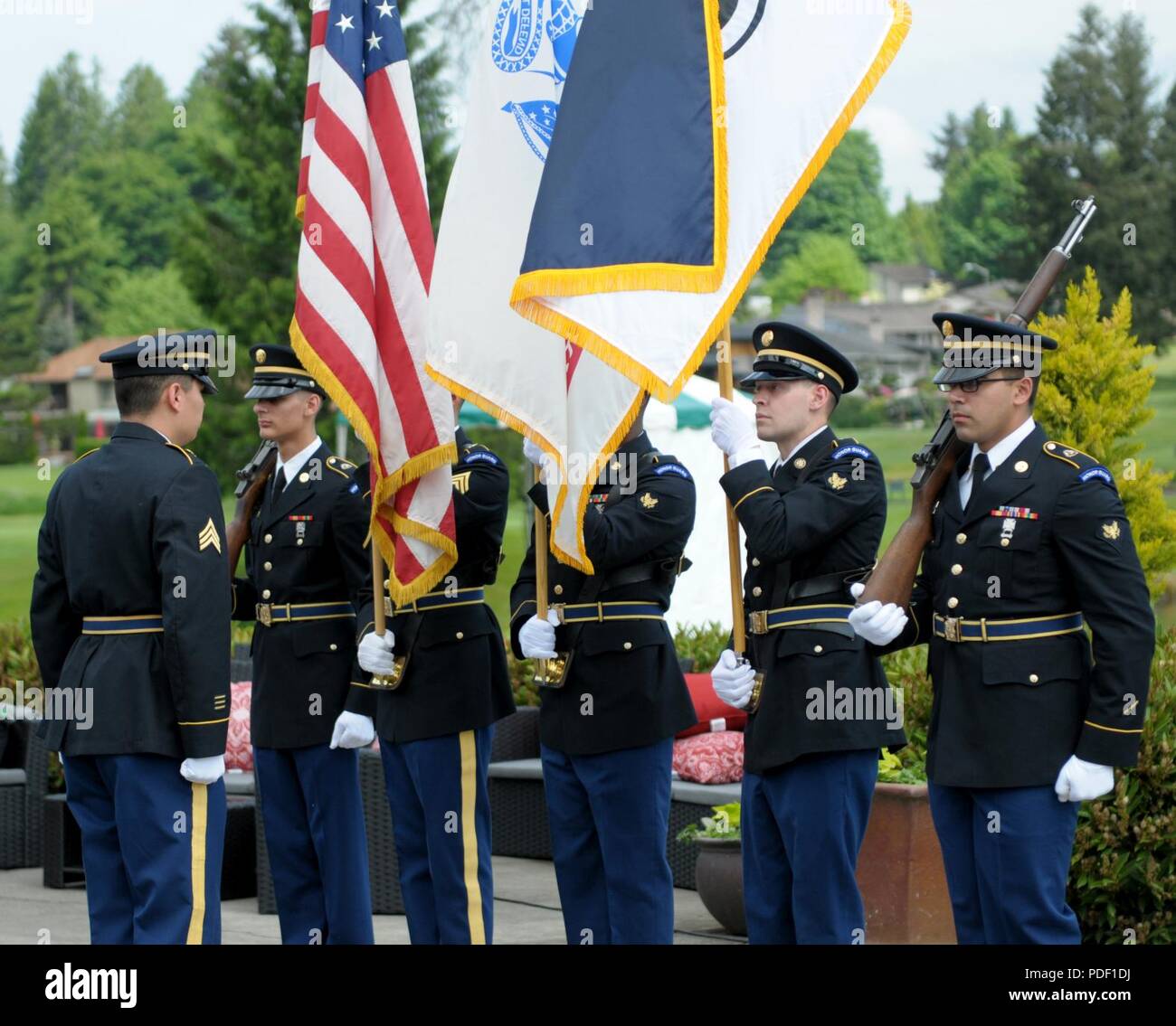 I Corps Honor Guard, from Joint Base Lewis-McChord, presents the National, Army and I Corps Colors during the opening ceremonies during the Muckleshoot Casino Washington Open Pro-Am May 19 at the Meridian Valley Country Club in Kent, Washington. The event took place over Armed Forces Weekend.   U.S. Army Stock Photo