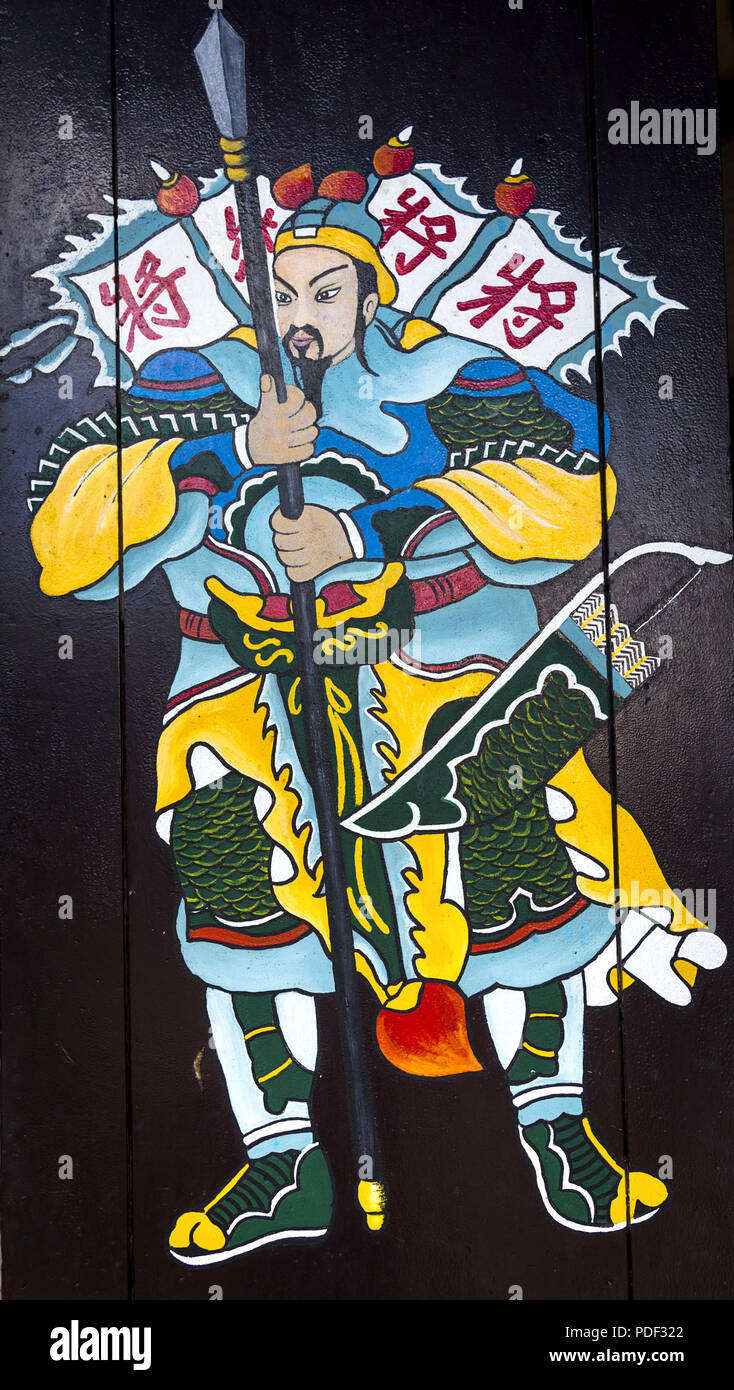 Colorful Samurai warrior painted on a black door. editorial, hoi an, Vietnam Stock Photo