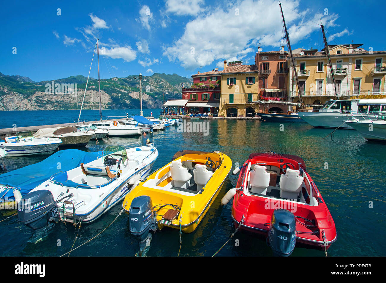 Boats at harbour of Malcesine, province Verona, Lake Garda, Lombardy, Italy Stock Photo