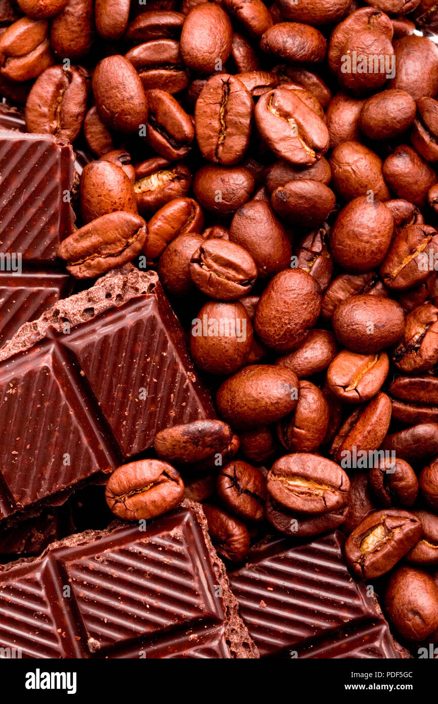 coffee beans and black chocolate background Stock Photo Alamy