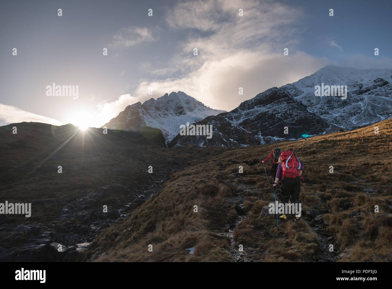 Mountaineers approaching the Cuillin ridge, isle of Skye Stock Photo