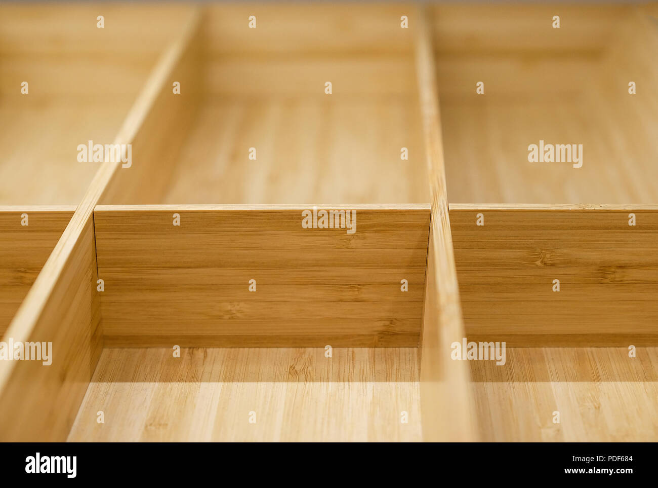 Bamboo drawer surface. Texture Wooden Background. Box with cells made ...