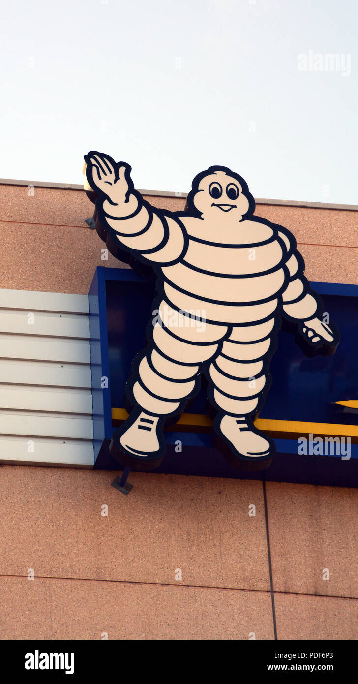 Bibendum at the top of Michelin headquarters building, Clermont-Ferrand, Auvergne, Massif-Central, France Stock Photo