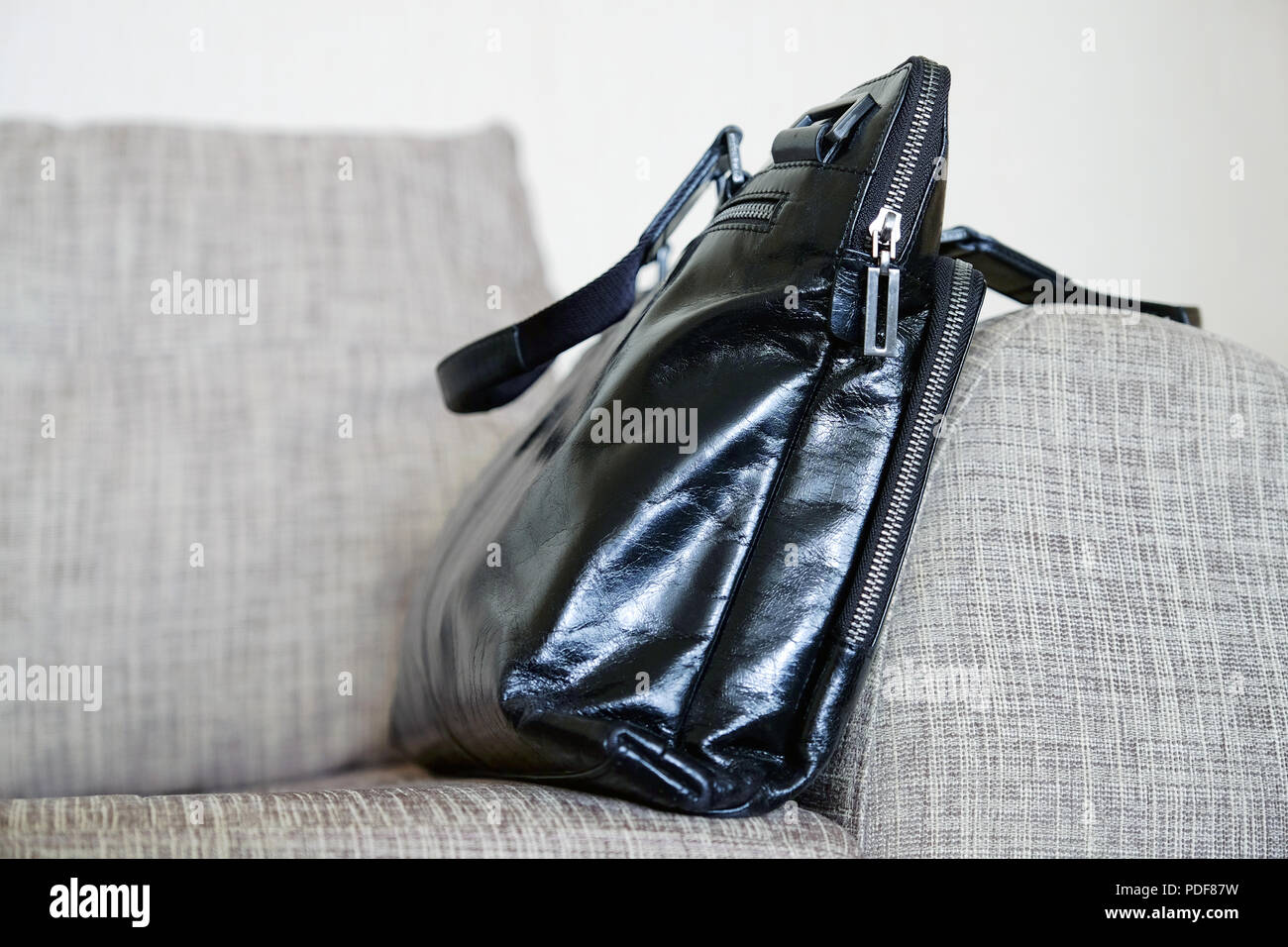 Zip on a leather bag. Close up Stock Photo