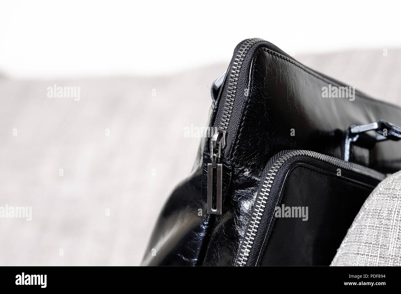 Zip on a leather bag. Close up Stock Photo