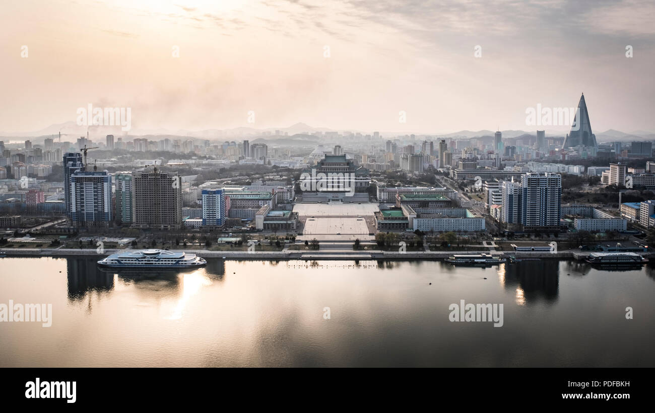View across the River Taedong from the Juche Tower, Pyongyang, North Korea, Asia. The as yet unopened Ryugyong Hotel is far right. Stock Photo