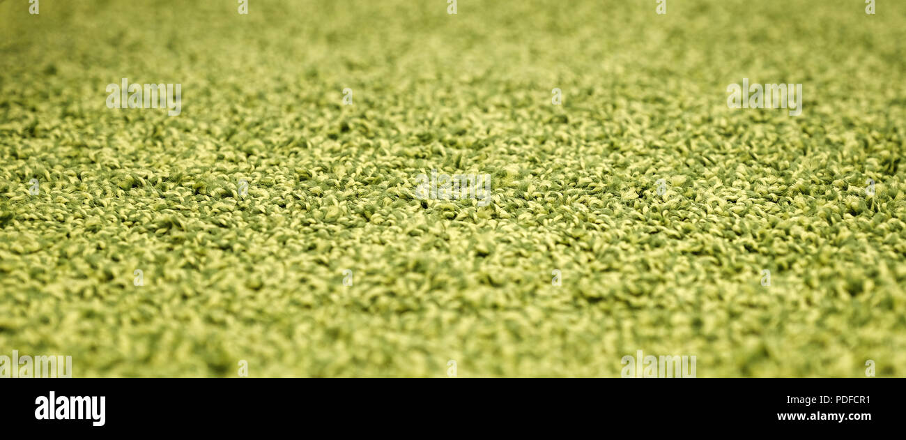 Stack gray bath mats bath mats Stack, stacked on top of each other. Terry mats. Stock Photo