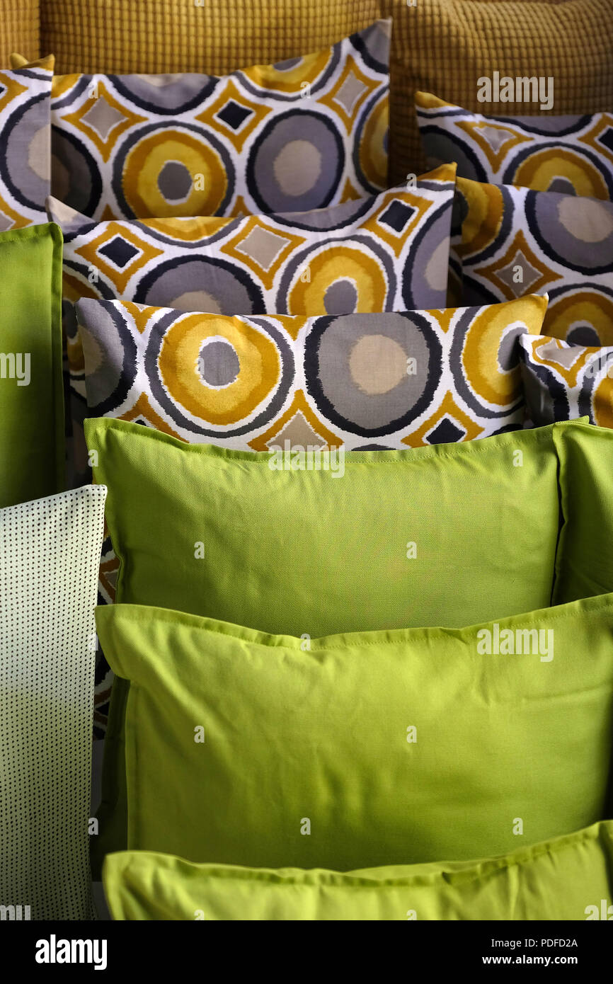 Colorful pillows stacked one to another. Cushions for sofa Stock Photo