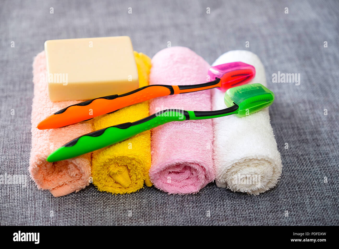 Soap and towel. Shower accessories. Hygiene items. Toothbrush Tooth