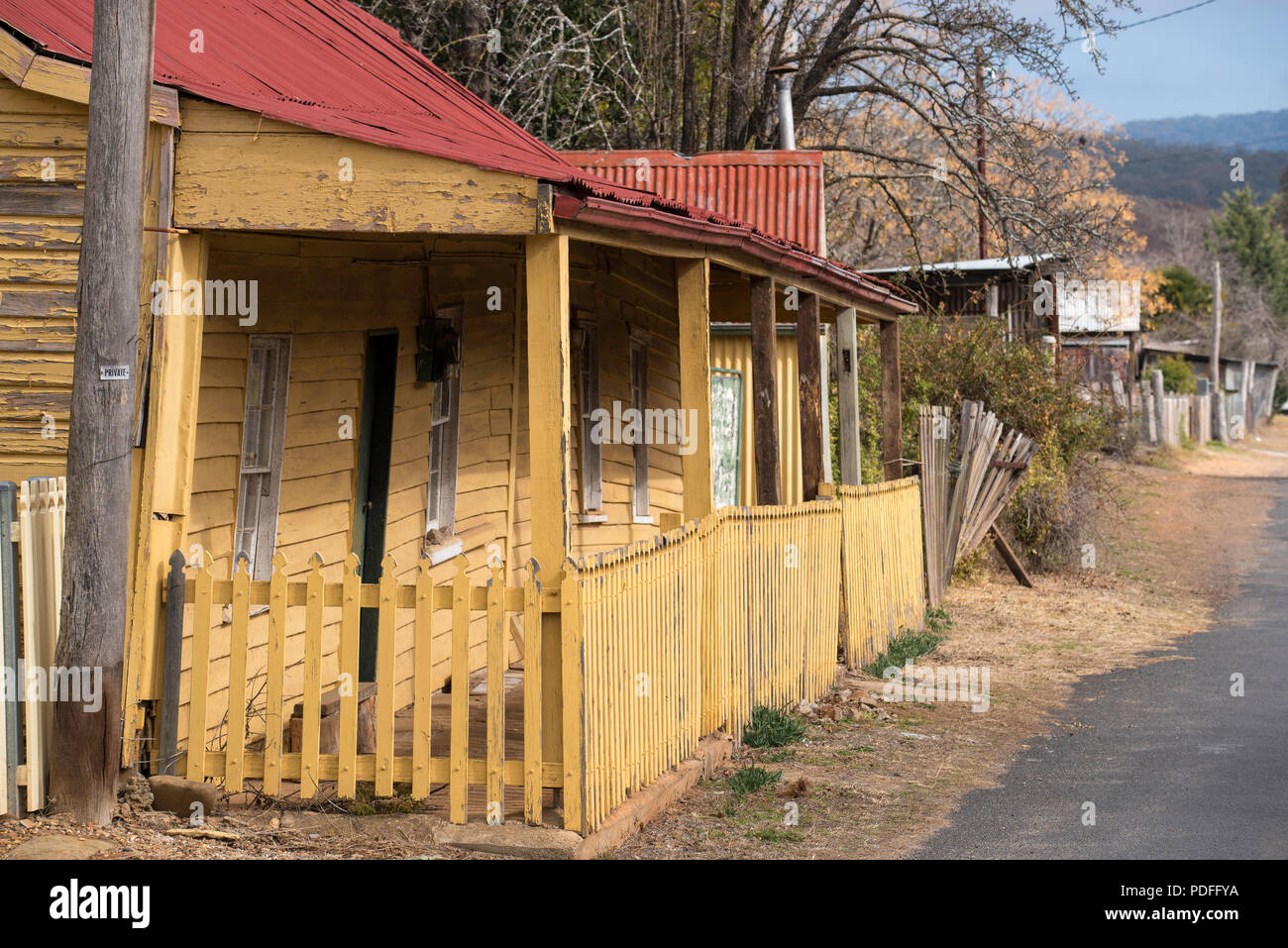 A small timber and iron roof miners' cottage on Bowen Street, Sofala, New South Wales Australia. Sofala is an old heritage-listed gold mining town. Stock Photo