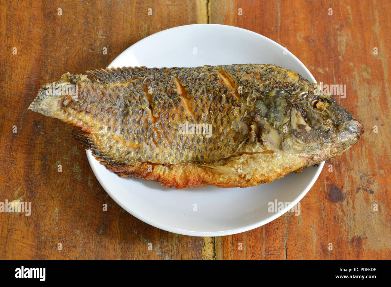 deep fried mango fish on dish Stock Photo Alamy