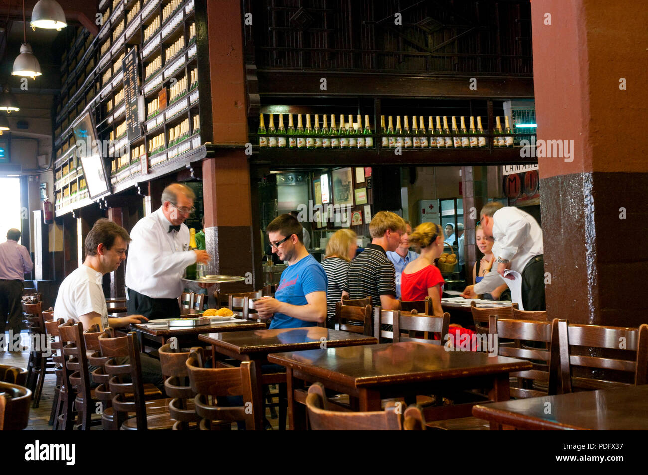 People having lunch at Casa Mingo restaurant. Madrid, Spain. Stock Photo