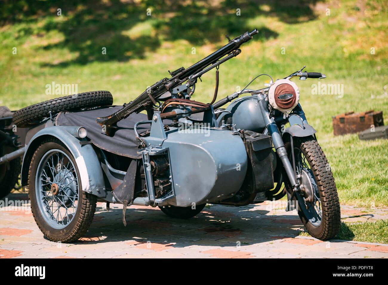 Old Tricar, Three-Wheeled Motorbike With The Machine Gun On Sidecar Of Wehrmacht, Armed Forces Of Nazi Germany Of World War 2 Time In Summer Sunny Par Stock Photo