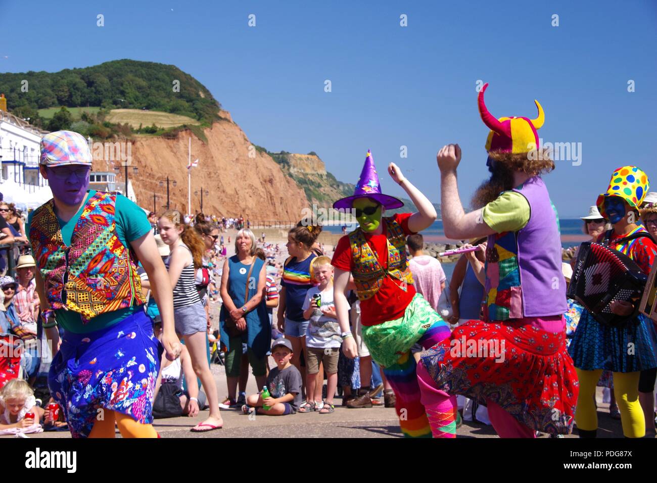 Gog Magog Molly, MultiColoured Fen Morris Dancers. At Sidmouth Folk