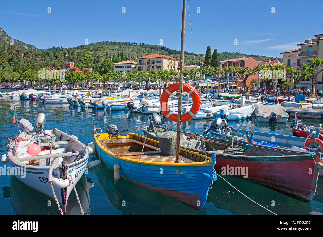 Fishing boats at the harbour, lake promenade, Garda, province Verona, Lake Garda, Lombardy, Italy Stock Photo