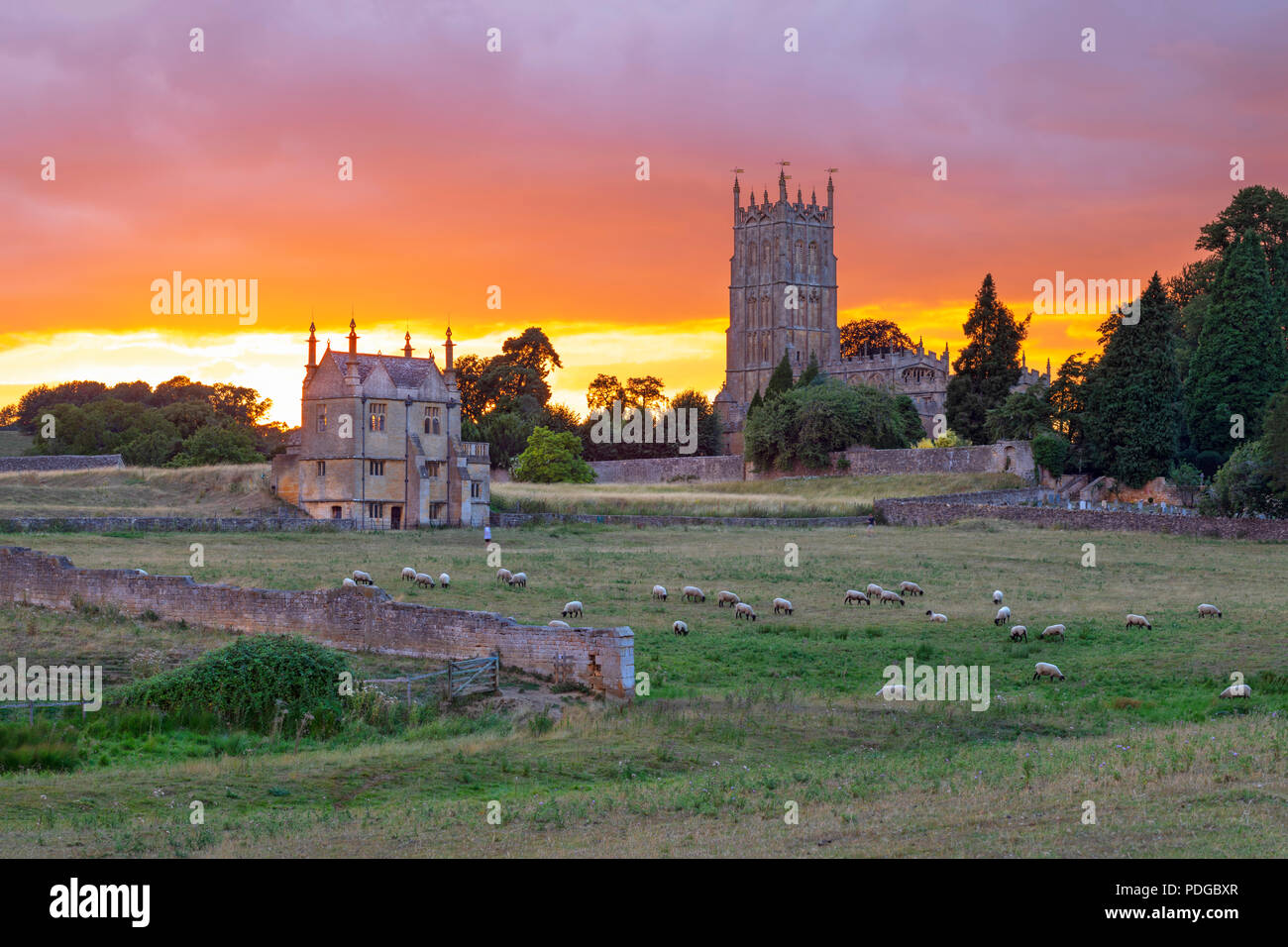 East Banqueting House of Old Campden House and St James' church in the coneygree field at sunset, Chipping Campden, Cotswolds, Gloucestershire Stock Photo