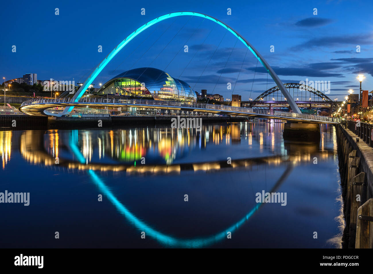 Gateshead Millennium Bridge across the Tyne river between Gateshead and Newcastle Stock Photo
